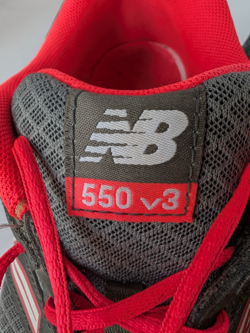 New Balance 550 v3 Dark Gray with Coral Accent Running Shoes - Picture 7 of 8
